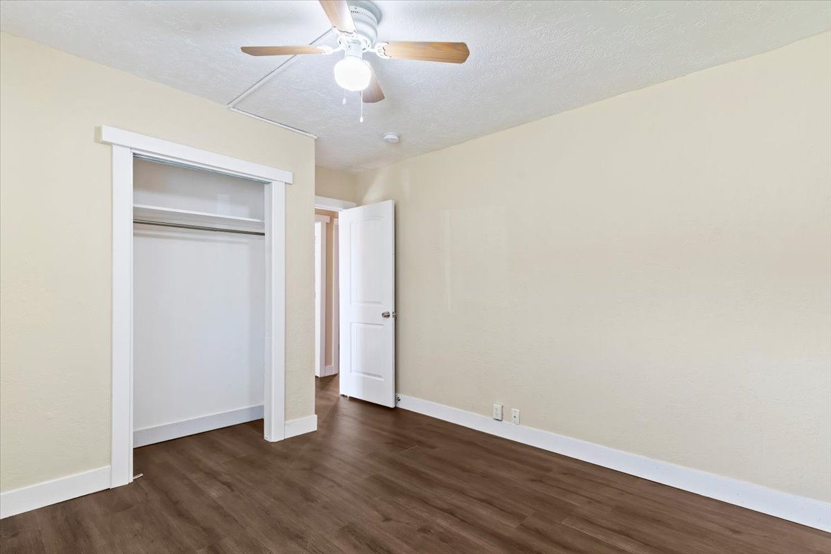 Second bedroom with closet, directly across from bathroom.