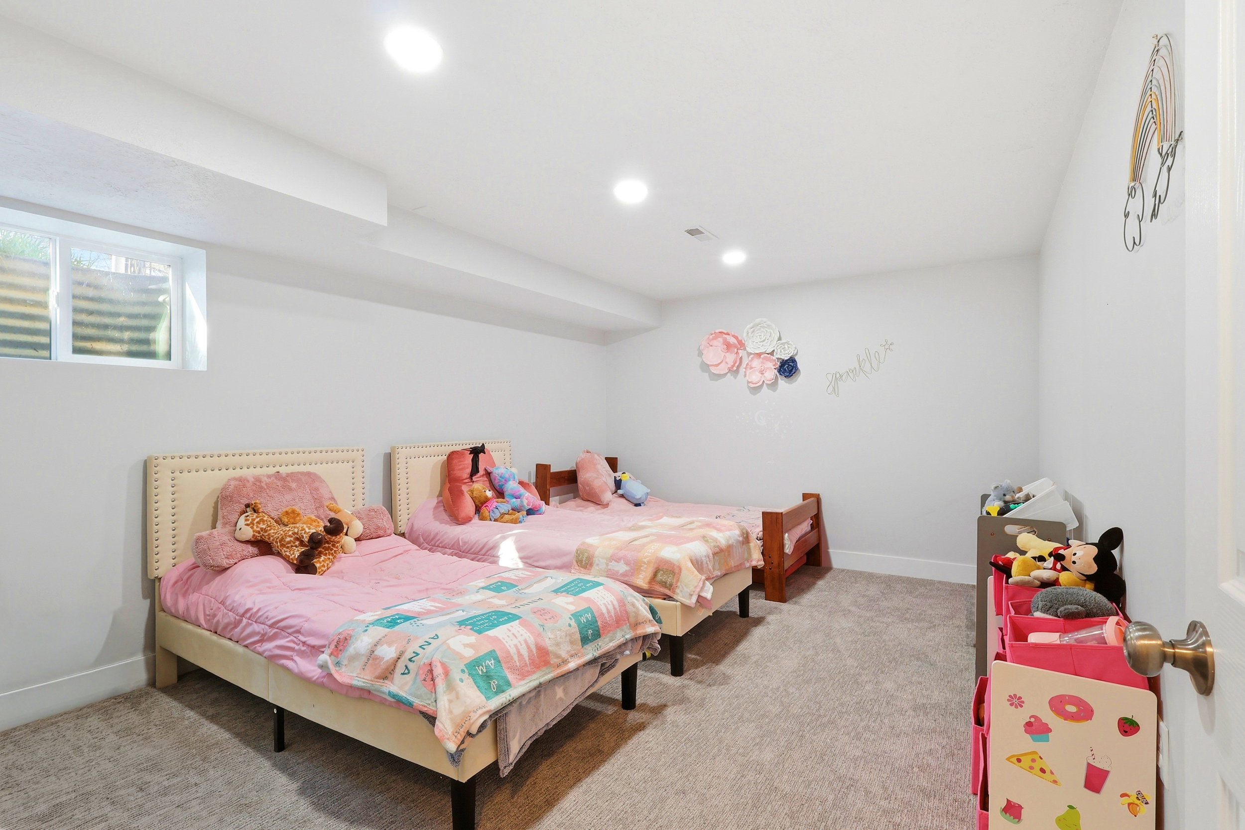 Bedroom featuring light carpet and recessed lighting