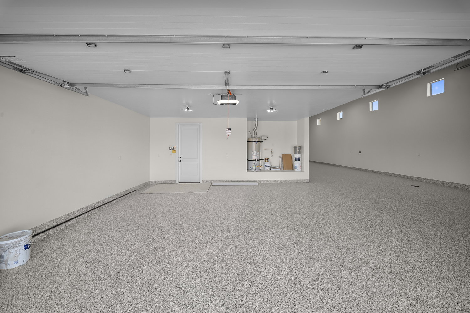 Garage with strapped water heater