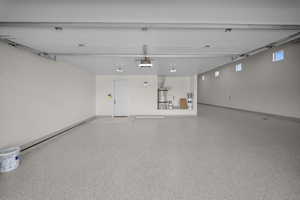 Garage with strapped water heater