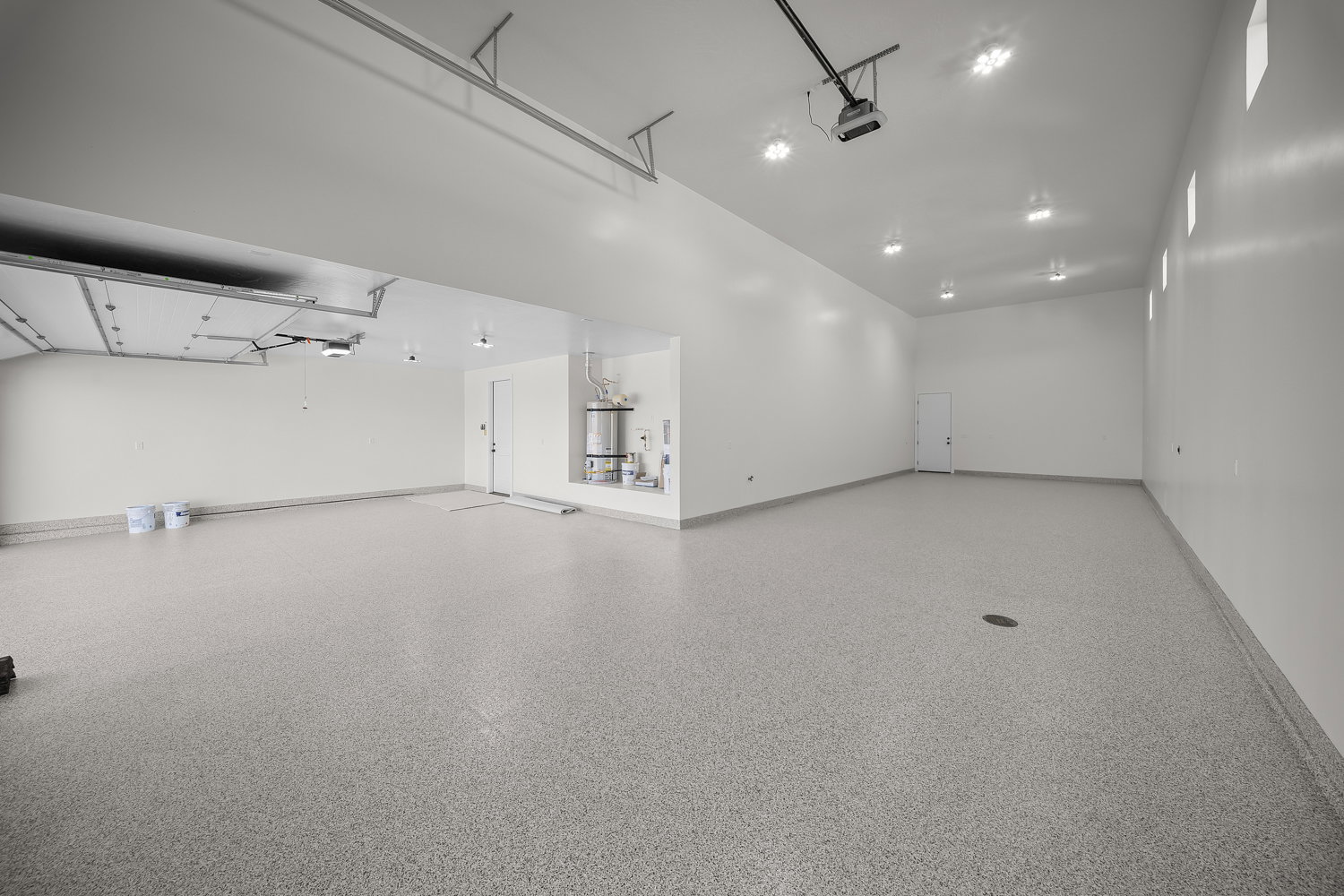Garage with strapped water heater