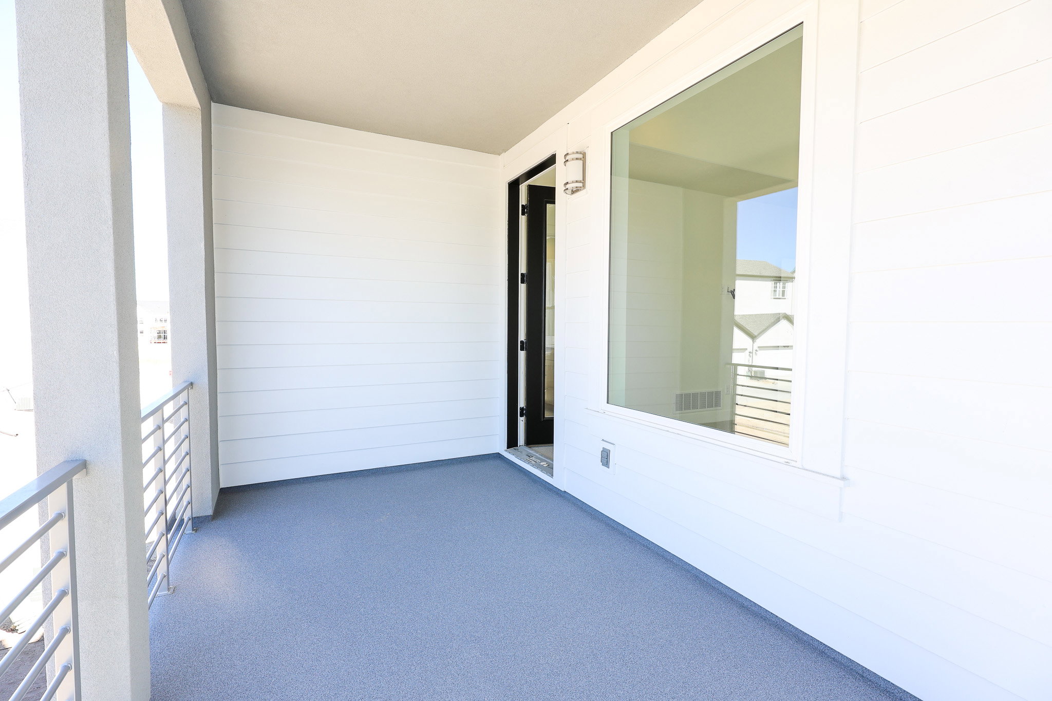 View of balcony off of Primary bedroom