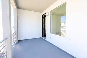 View of balcony off of Primary bedroom