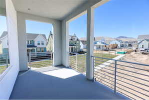 Balcony with a residential view off of Primary bedroom