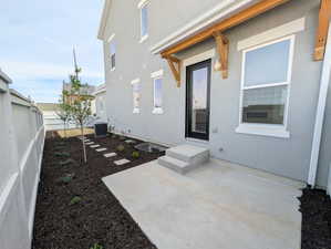 Fenced backyard featuring a patio