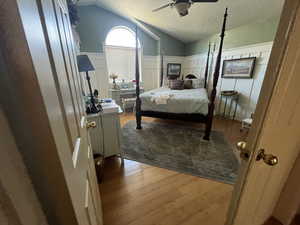 Bedroom featuring light wood-type flooring and ceiling fan