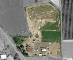 Aerial view of property and surrounding area with rural landscape
