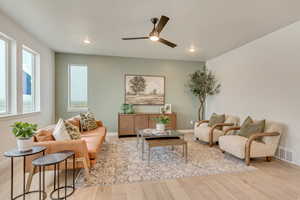 Living room.  Photo is of a model home and not of actual home. Finishes may vary.