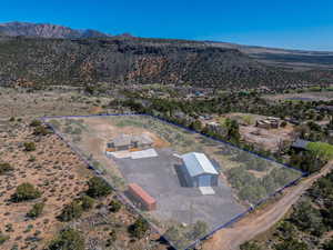 Aerial overview of property's location featuring property boundaries highlighted and mountains