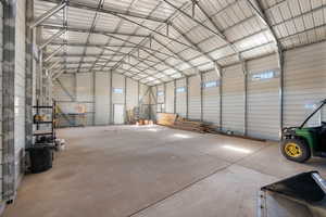 Garage featuring metal wall