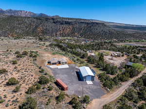 View of rural area with a mountainous background and a desert landscape