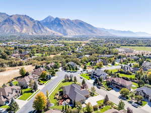 Aerial view of residential area with a mountain backdrop