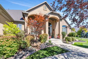 Fall View of front of house with brick  and stucco