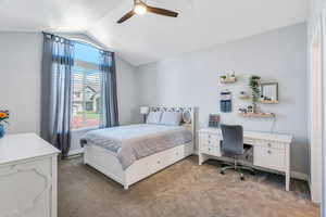 Bedroom featuring  carpet, and a  ceiling fan