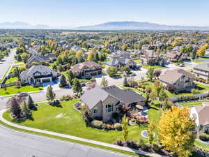 Aerial perspective of suburban area with a mountainous background
