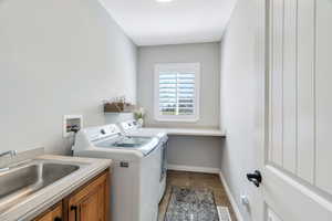 Laundry room with tile flooring