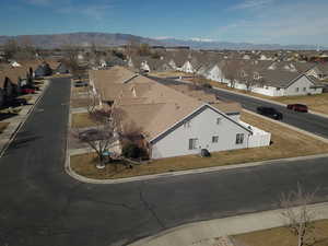 Aerial view of residential area with a mountain backdrop