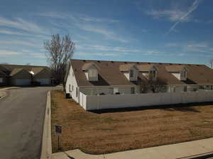 View of side of home with a residential view