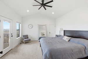 Primary Bedroom with access to outside, light colored carpet, a ceiling fan, and vaulted ceiling