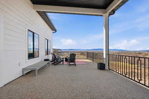 View of patio / terrace with a mountain view