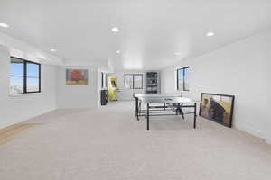Playroom featuring light carpet and recessed lighting