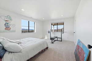 Bedroom featuring carpet flooring and recessed lighting
