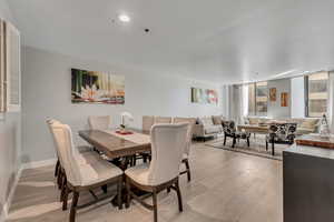 Dining area featuring light wood-style floors