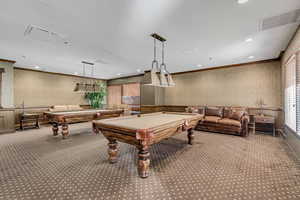 Rec room with wallpapered walls, pool table, recessed lighting, and ornamental molding