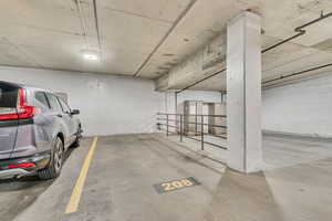 Garage featuring a parking deck