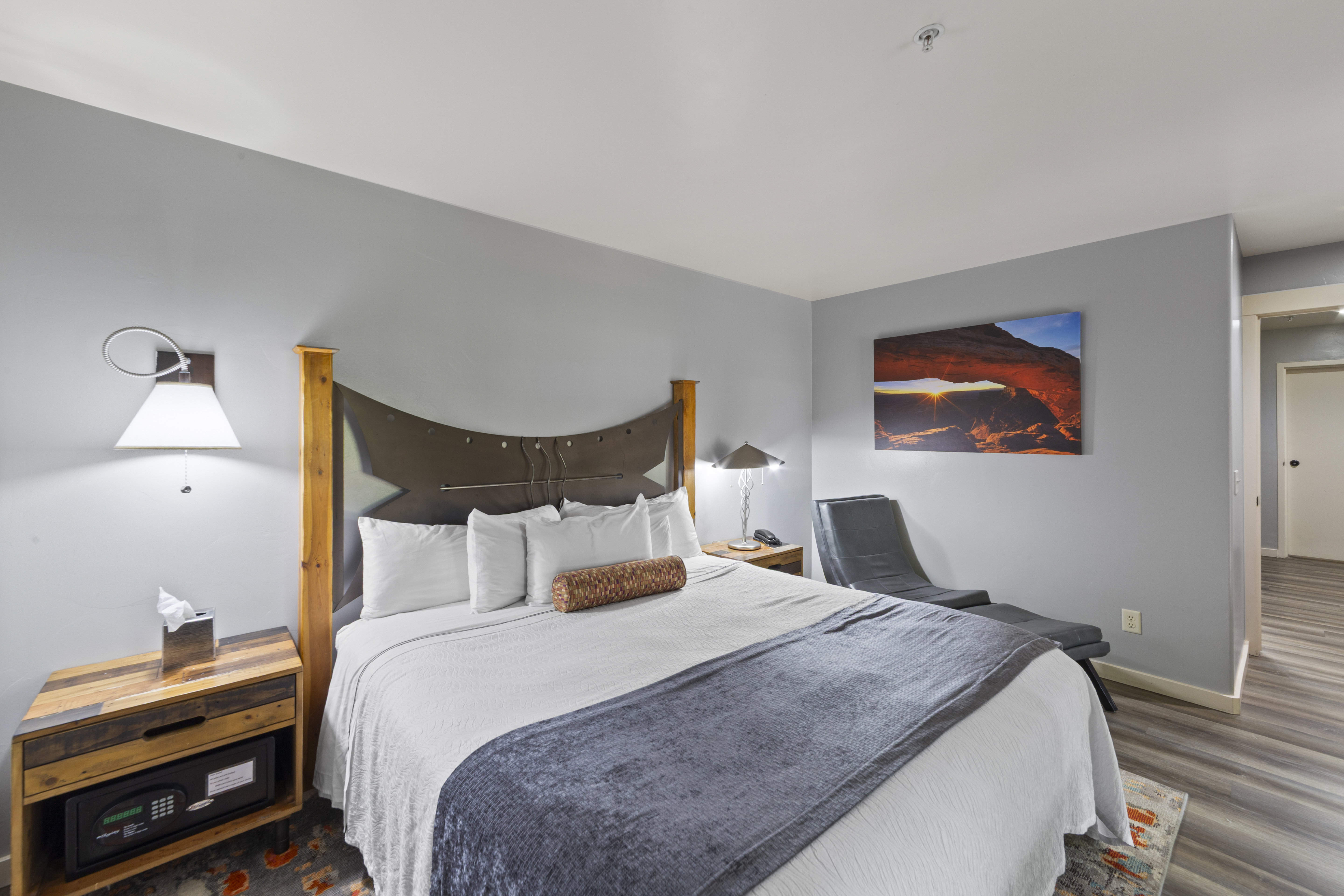 Bedroom with baseboards and wood finished floors
