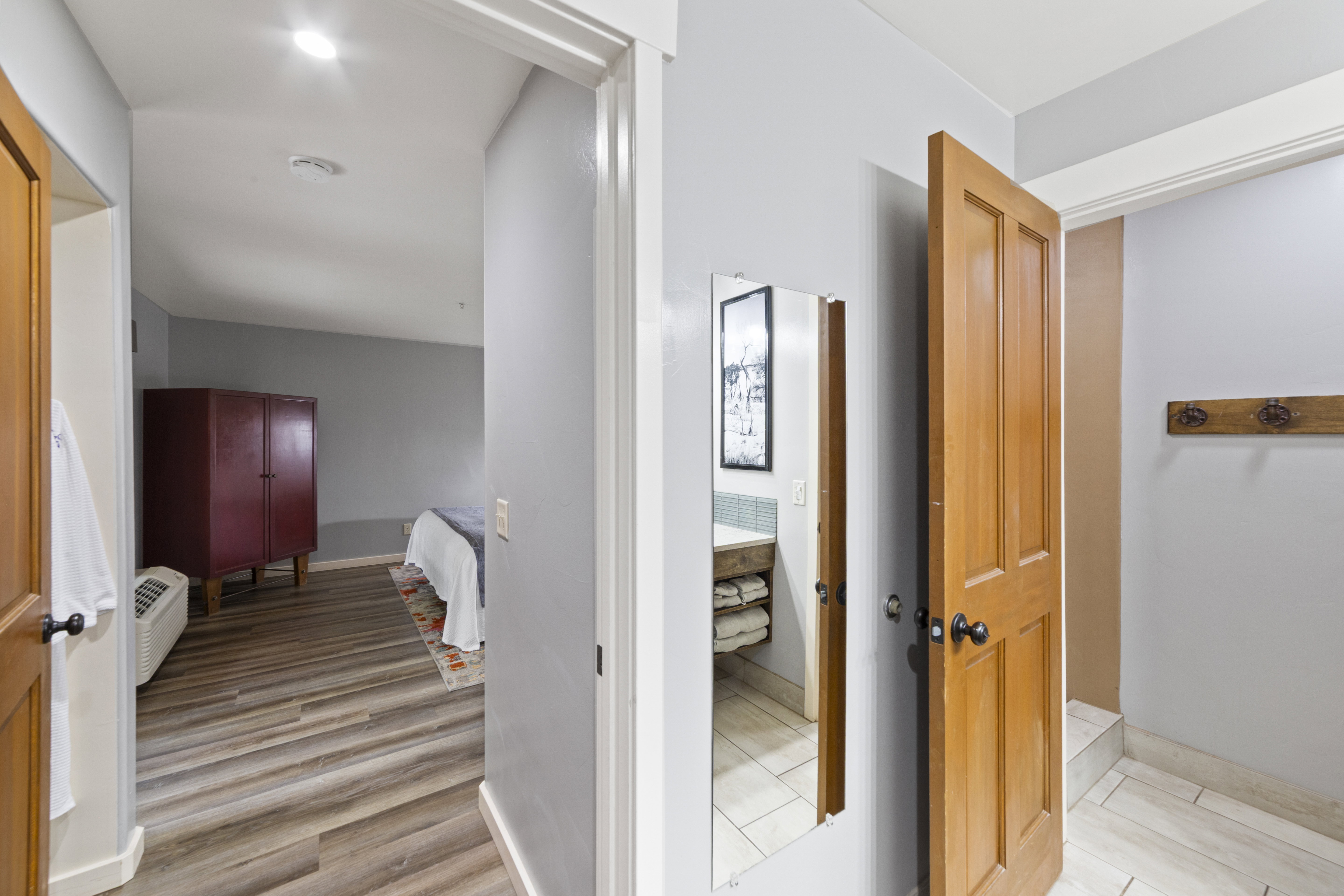 Hallway featuring light wood-type flooring