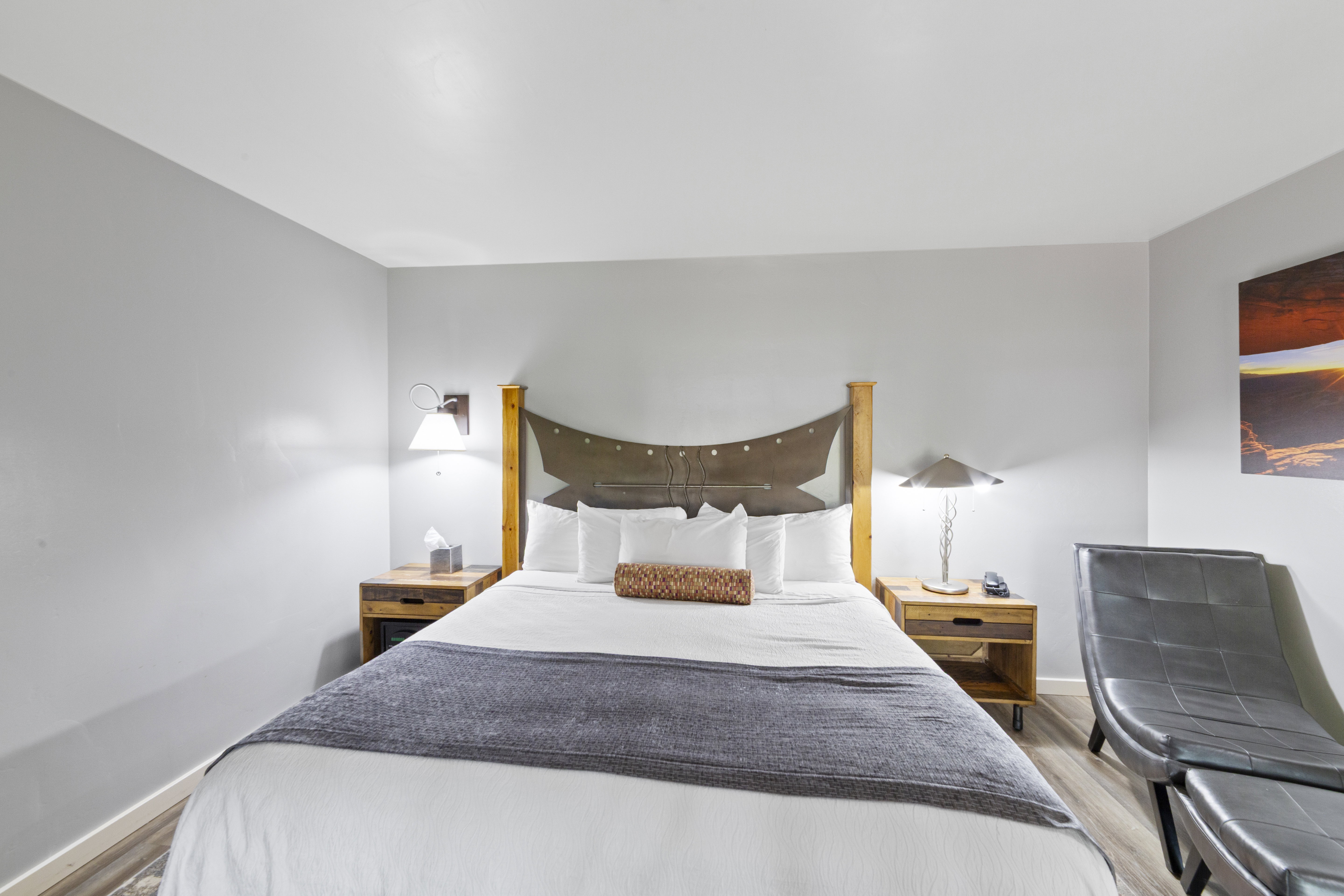 Bedroom with light wood-style floors and baseboards