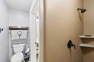 Half bathroom featuring toilet