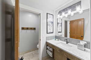 Bathroom with vanity and light tile patterned floors