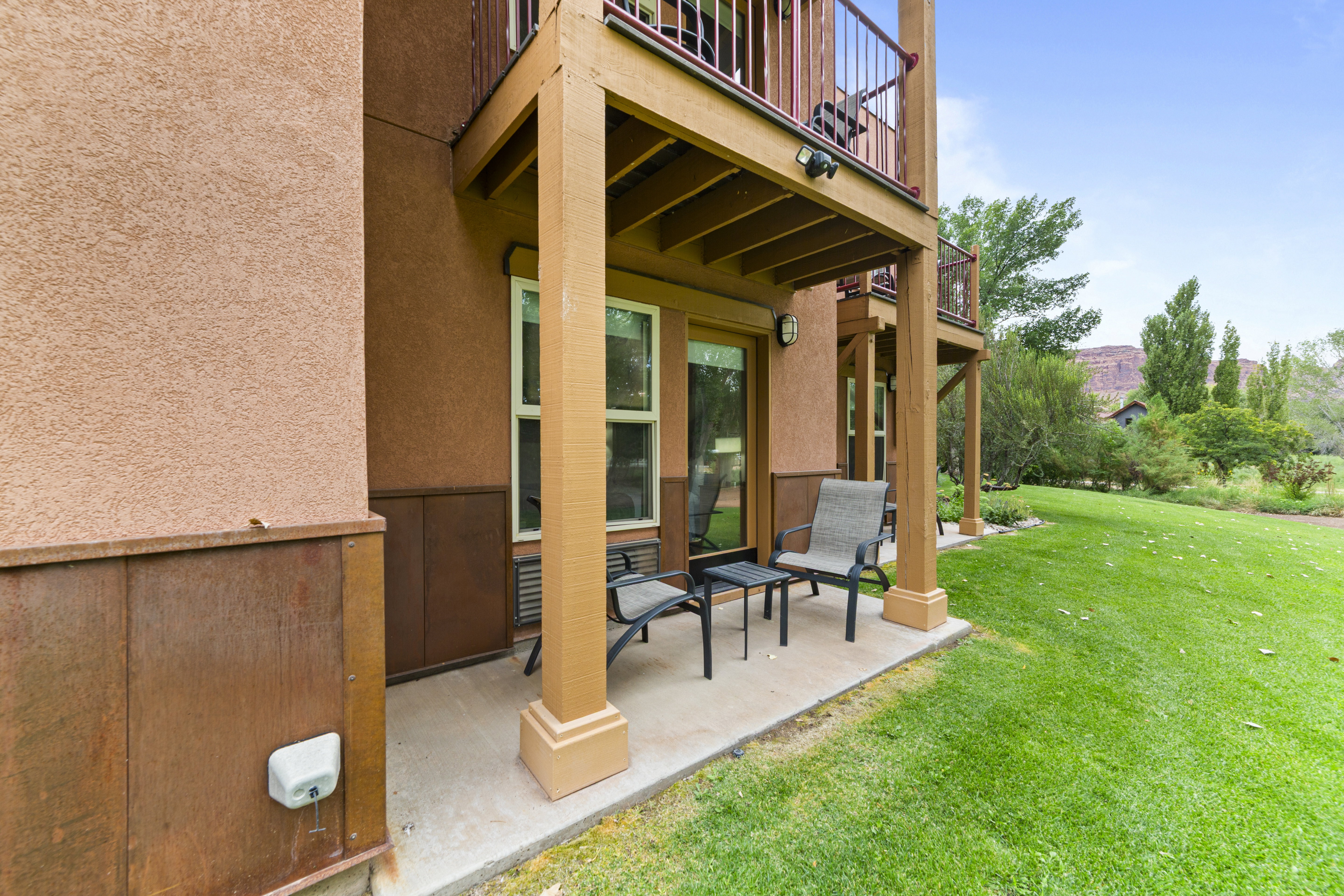 Patio / terrace with a lawn and a patio
