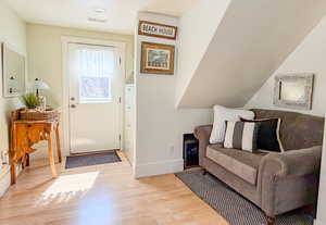 Upstairs Family Room with a door out to the balcony.