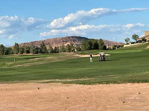 Surrounding community featuring view of golf course and a mountain view