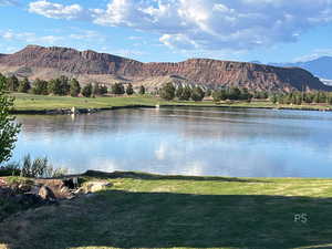 Water view with a mountainous background