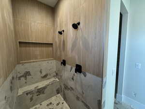 Bathroom featuring tiled shower