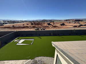 View of yard featuring a mountain view and a patio
