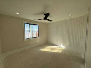 Spare room with recessed lighting and ceiling fan