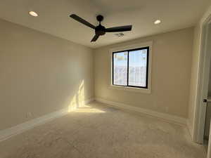 Spare room with recessed lighting and ceiling fan