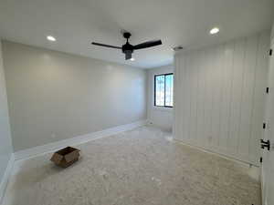 Unfurnished room featuring recessed lighting, ceiling fan, and light floors