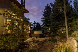 Yard at dusk with a patio