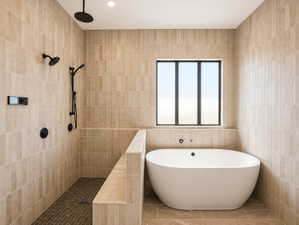 Primary bathroom featuring a freestanding soaking tub and a spacious walk-in shower