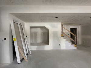Book nook under staircase in basement