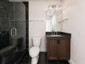 En-suite bathroom for bedroom in basement.