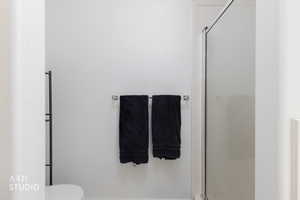 Primary Ensuite Bathroom with a shower stall