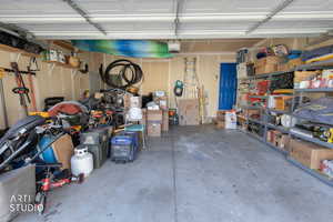Garage featuring a garage door opener