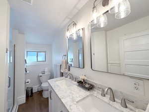 Bathroom with a walk-in, tiled shower with a bench